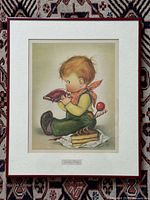 Full view of framed Charlot Byj print with mat and red frame