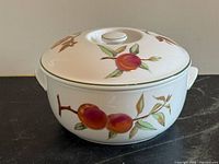 Covered vegetable dish front view