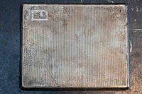 Front view showing monogram and pattern