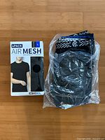 Box of 4-pack Air Mesh shirts size L and bag containing boxer briefs