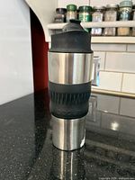 Full view of Bodum travel French press mug standing upright
