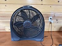 Front view of Lasko Cyclone fan showing grille and blades