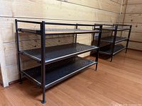 Two black 2-tier shoe racks placed side by side showing overall form