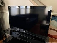 Front view of Sony television on stand