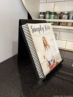 Front view of cookbook stand displaying cookbook