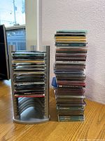 tower with discs and adjacent stacked CDs