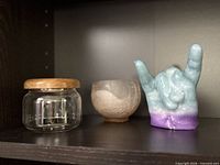 Front view of all three items on shelf