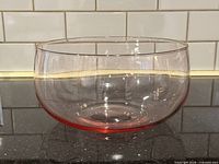 Side view of pink glass bowl