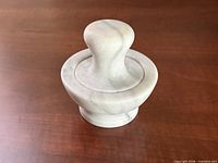 marble mortar and pestle assembled, side view