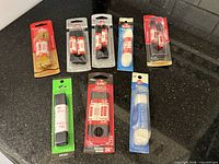 All seven sealed lace packages laid out