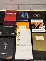 All eleven DVD screeners laid out