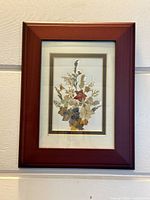 Front view showing entire framed pressed flower artwork