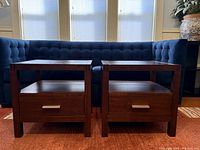 Front view of both matching wooden end tables