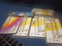 Five blister-carded R7s halogen bulb packages laid out on surface