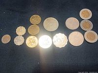Full lineup of 14 Hong Kong coins showing range of denominations and metals