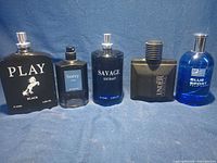 Front view of all five cologne bottles