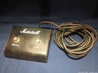 Top view of Marshall dual footswitch showing two labeled switches and logo