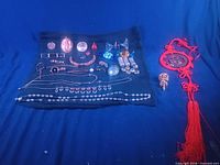 Full lot overview on cloth and tassel ornament