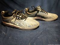 Side profile of both shoes showing uppers, color and design