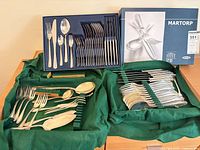 Overview showing both Martin 90 silver-plate pieces and boxed IKEA Martorp set