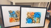 Front view of both framed watercolours side by side