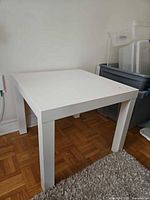 side view of Ikea white square side table