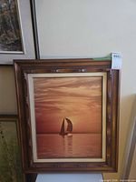 Front view of framed sailboat canvas print