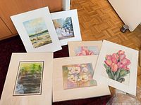 Group shot of six matted watercolours