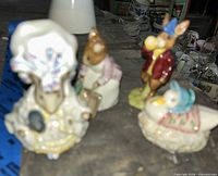 All four Beswick Beatrix Potter figurines grouped on table