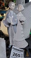 Front view of Lladro bride and groom figurine