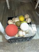 Top view of crate with assorted balls