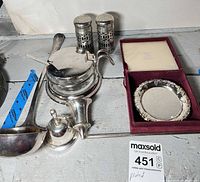 Group shot showing all silver-plated items together