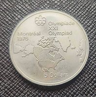 reverse showing North America map, Olympic logo, denomination