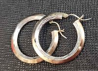 Full view of both sterling silver hoop earrings