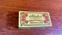 Top view of Huyler's Marshmallows tin showing logo and art nouveau decoration