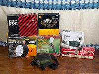 Group shot of all six items showing boxes and loose device