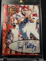 Front view of card showing Tim Rattay image, Press Pass Authentics seal, full autograph, card in holder