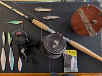 All items laid out: rod, reels, lures