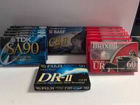 Front view of all sealed cassette tapes showing brands and quantities