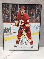 Full view of framed autographed photo