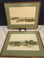 Both framed paintings front view