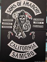 All twelve Sons of Anarchy embroidered patches laid out on black background