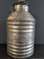 Full view of galvanized oil can front