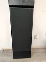 Front view of one Vivid TX-475BLK speaker with grille