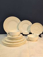 Group shot of entire set showing dinner plates, salad plates and two soup bowls