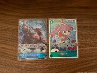 Front view of both One Piece TCG SR cards: Whitebeard and Perona