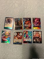 Front view of all eight OP-08 SR cards laid out