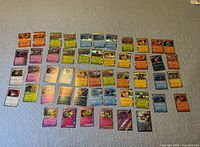 Top-down view showing all Pokémon cards laid out in rows