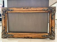 Front view of ornate wooden picture frame