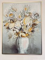 Vertical beige floral canvas in metallic frame